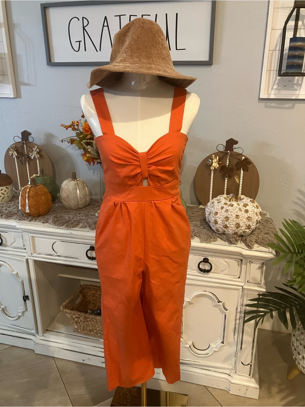 Sleeveless Orange Wide-Leg Jumpsuit with Front Twist